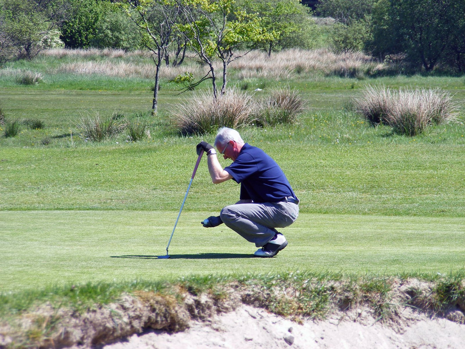 accept defeat on the golf course